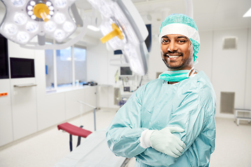 Image showing smiling indian male doctor or surgeon at hospital