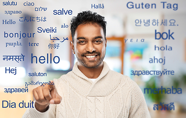 Image showing indian man over words in foreign languages