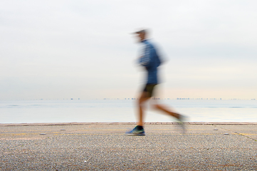 Image showing Jogging on a quayside