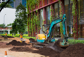 Image showing Workers work in park. Singapore