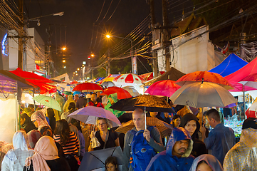 Image showing Crowded Thailand rainy street 