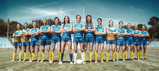 Image showing Female team of rugby players at the stadium