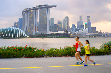 Image showing Couple running in Singapore