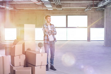 Image showing portrait of young businessman on construction site