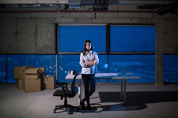 Image showing young female architect and engineer on construction site