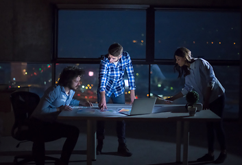 Image showing business people on construction site  in new startup office at n