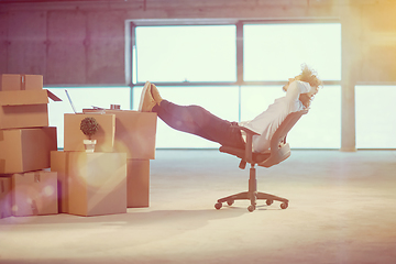 Image showing young business man taking a break on construction site