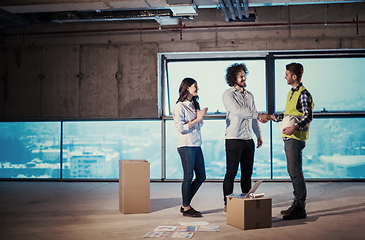 Image showing business people in group, architect and engineer on construction