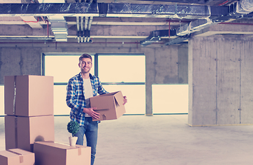 Image showing portrait of young businessman on construction site