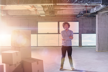 Image showing portrait of young businessman on construction site