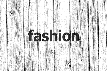 Image showing Text Fashion. News concept . Wooden texture background. Black and white