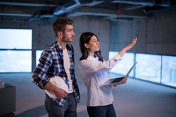 Image showing business people in group, architect and engineer on construction