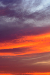 Image showing Dramatic sky at sunset with red, yellow and orange colors.