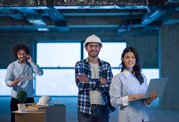 Image showing business people in group, architect and engineer on construction