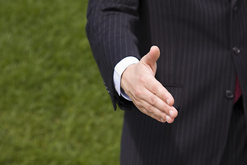 Image showing businessman handshake