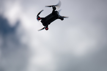 Image showing toy drone dramatic sky background 