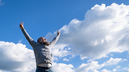 Image showing bearded man winner pose