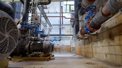 Image showing Boiler room full of pipes sliding movement motion