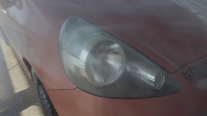 Image showing Eashing dirty car closeup footage