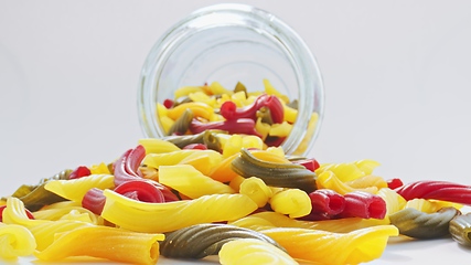 Image showing Whole grain colorful pasta in camera motion