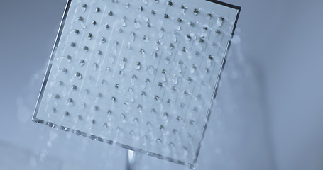 Image showing Water flowing from shower head 120 fps slow motion closeup footage