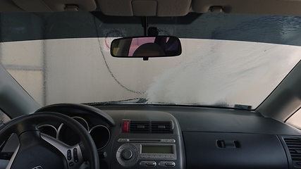 Image showing Eashing dirty car closeup footage