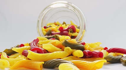 Image showing Whole grain colorful pasta in camera motion