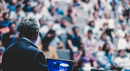 Image showing Public speaker giving talk at Business Event.