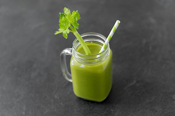 Image showing close up of glass mug with green celery juice