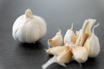 Image showing garlic on slate stone background