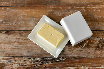 Image showing close up of butter on wooden table