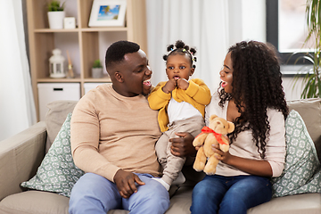 Image showing happy african family with baby daughter at home