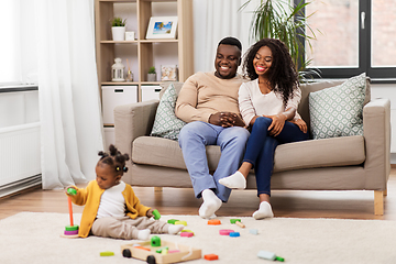 Image showing african family with baby daughter playing at home