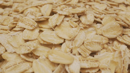 Image showing Oat flakes macro footage with camera motion