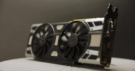 Image showing Graphics card against dark background spinning around