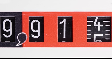 Image showing Numbers spinning in old counter