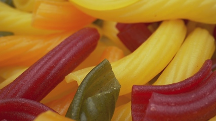 Image showing Whole grain colorful pasta in camera motion