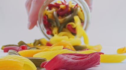 Image showing Whole grain colorful pasta in camera motion