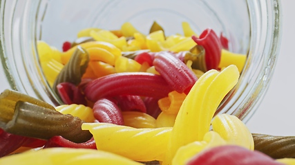 Image showing Probe lens push into jar with full of whole grain pasta