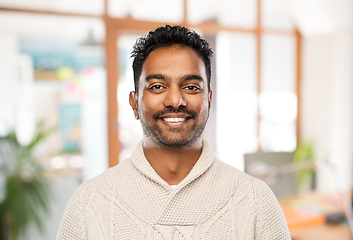 Image showing indian man in sweater over office background