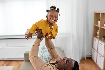 Image showing happy african american father with baby at home