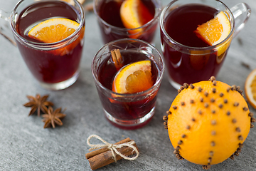 Image showing glasses of mulled wine with orange and cinnamon