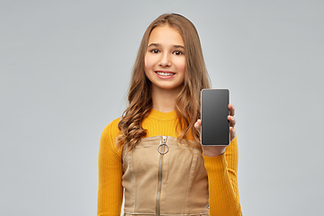 Image showing smiling teenage girl showing smartphone