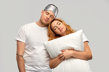 Image showing couple with eye sleeping mask and pillow