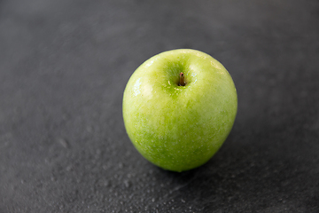 Image showing ripe green apple on slate stone background