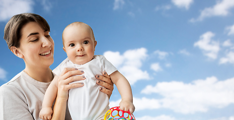 Image showing happy young mother holding little baby daughter