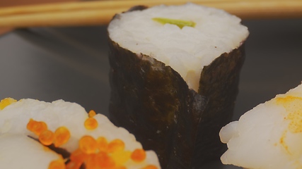 Image showing Sushi on the plate with camera motion macro footage