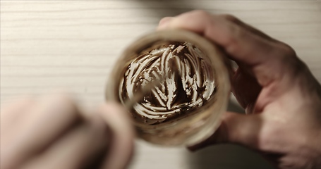 Image showing No more Chocolate cream in the jar