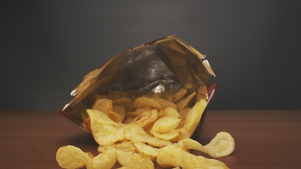 Image showing Potato chips in camera motion closeup footage