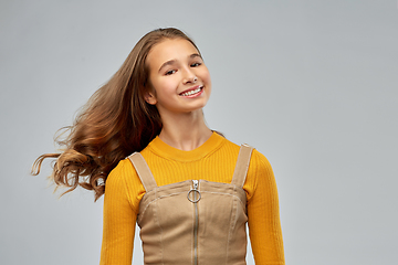 Image showing young teenage girl with waving long hair